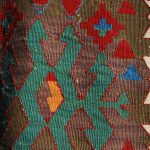 Brown color obtained from plants on a 19th century Konya kilim, Central Turkey