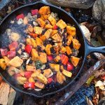 Camp cooking with legumes and potatoes