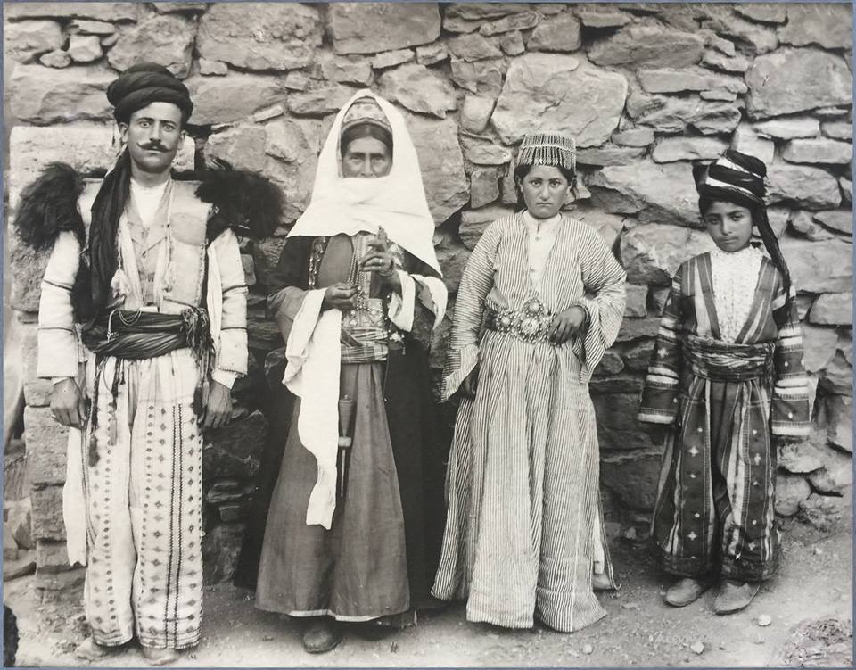 An Armenian family from Çatak, Van area, with the clothing they wove and tailored for their own use. the beginning of 20th century, Eastern Turkey