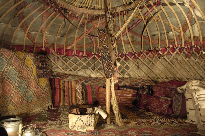 The interior of Anatolian Turkmen tent decorated with hand woven rugs
