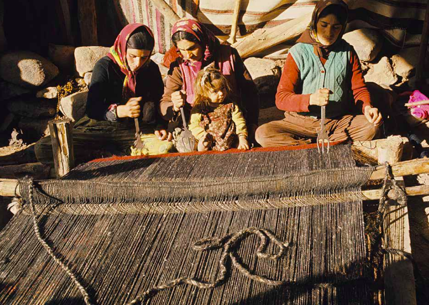 A Kurdish nomadic family in front of he loom, Pazarcık, KAhramanmarash, Eastern Turkey, photo courtesy Josephine Powell, Suna Kıraç Foundation